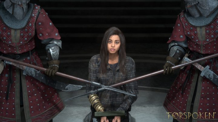 Frey is handcuffed and guarded in Forspoken.