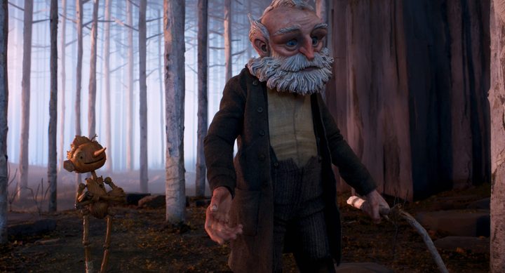 Pinocchio walks through a forest with Geppetto.