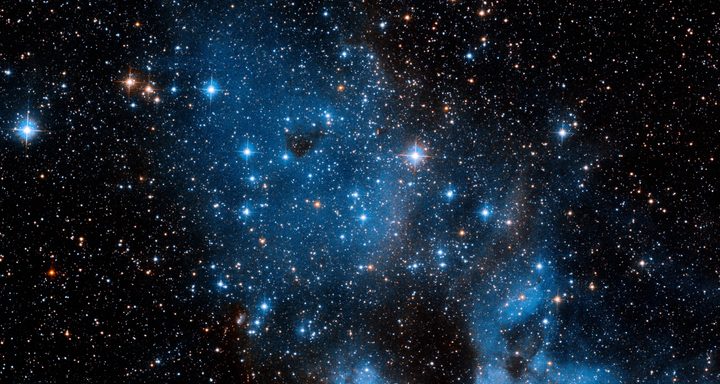 Against a backdrop littered with tiny pinpricks of light glint a few, brighter stars. This whole collection is NGC 1858, an open star cluster in the northwest region of the Large Magellanic Cloud, a satellite galaxy of our Milky Way that boasts an abundance of star-forming regions. NGC 1858 is estimated to be around 10 million years old.clock