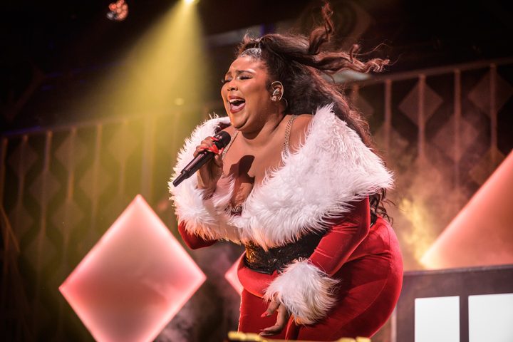 Lizzo performs at the iHeartRadio Jingle Ball.