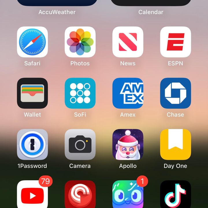 Sports scores for an NBA game displayed in an iPhone 14 Pro's Dynamic Island.