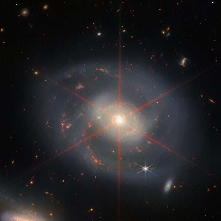 NGC 7469, a luminous, face-on spiral galaxy approximately 90 000 light-years in diameter that lies roughly 220 million light-years from Earth in the constellation Pegasus. Its companion galaxy IC 5283 is partly visible in the lower left portion of this image.