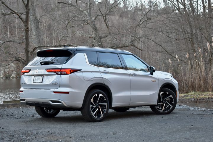 Rear three quarter view of the 2023 Mitsubishi Outlander PHEV.