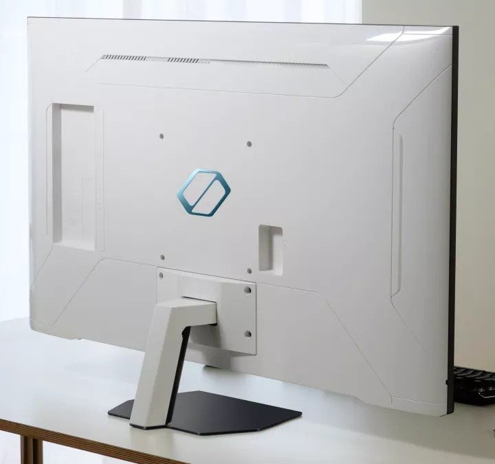 The back of the Samsung Odyssey Neo G7 gaming monitor on a desk.