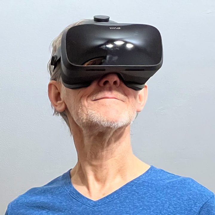 Alan Truly smiles in this closeup, while wearing the Varjo Aero VR headset.