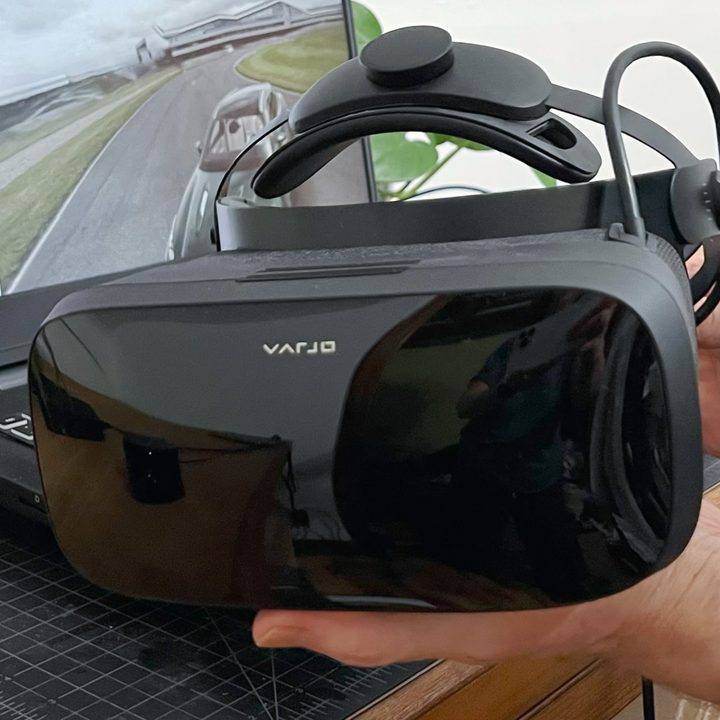 Closeup of the Varjo Aero VR headset being held by Alan Truly.