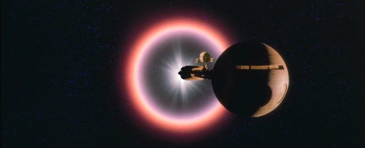 Discovery One floating behind a star in "2010: The Year We Made Contact."