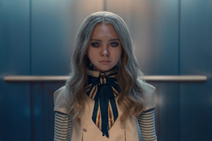M3GAN stands in the center of an elevator in "M3GAN."