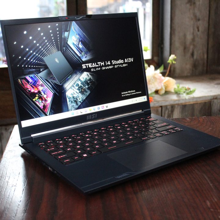 MSI's Stealth 16 Studio laptop sits on a table.