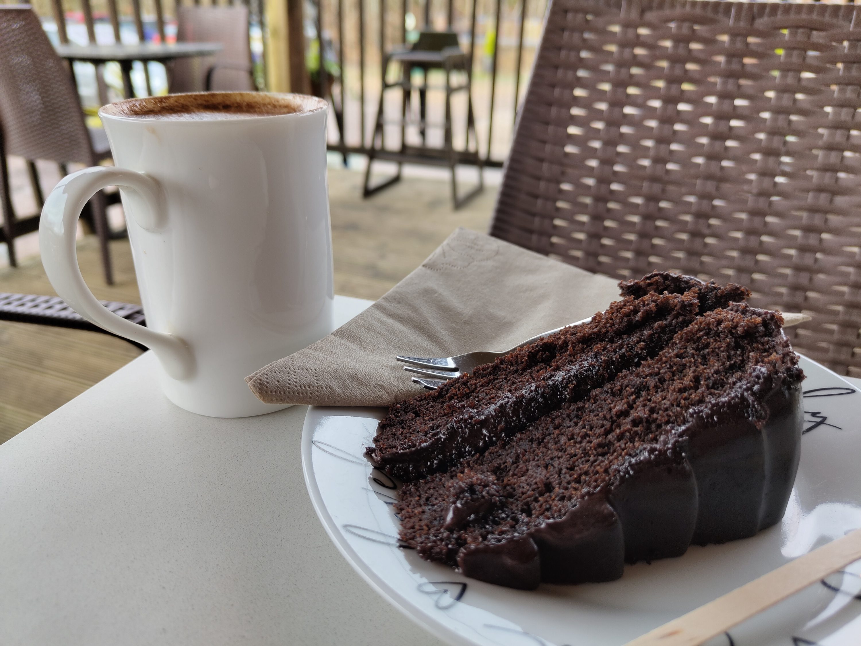 Photo of coffee and cake taken with the Nothing Phone 1.