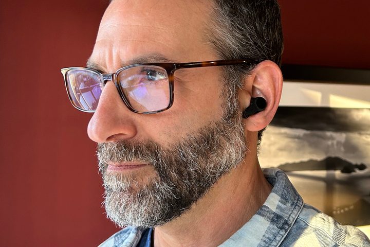Man wearing Audio-Technica ATH-TWX9.