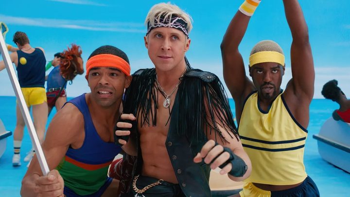 Ryan Gosling as Ken with two other Kens preparing for battle in Barbie.