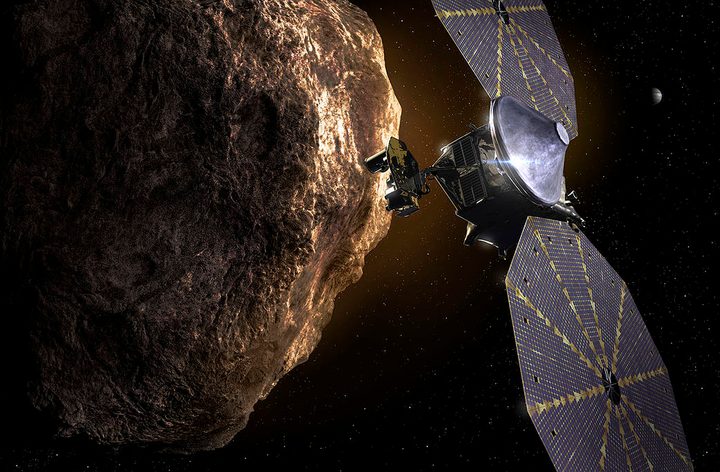 Illustration of Lucy passing by an asteroid.