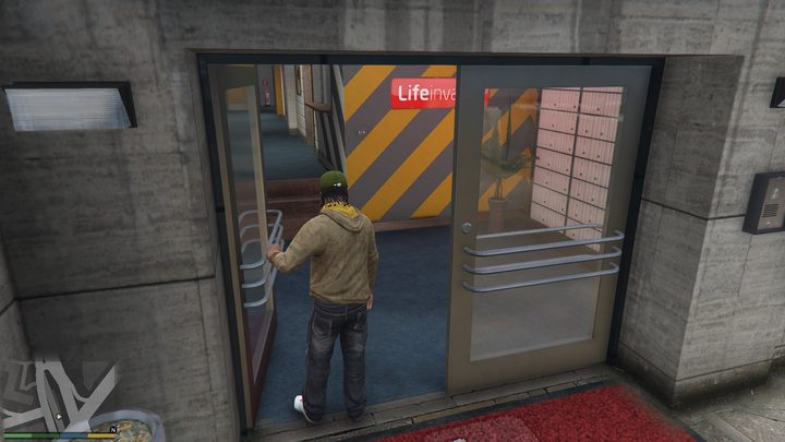 A man walking into a building.