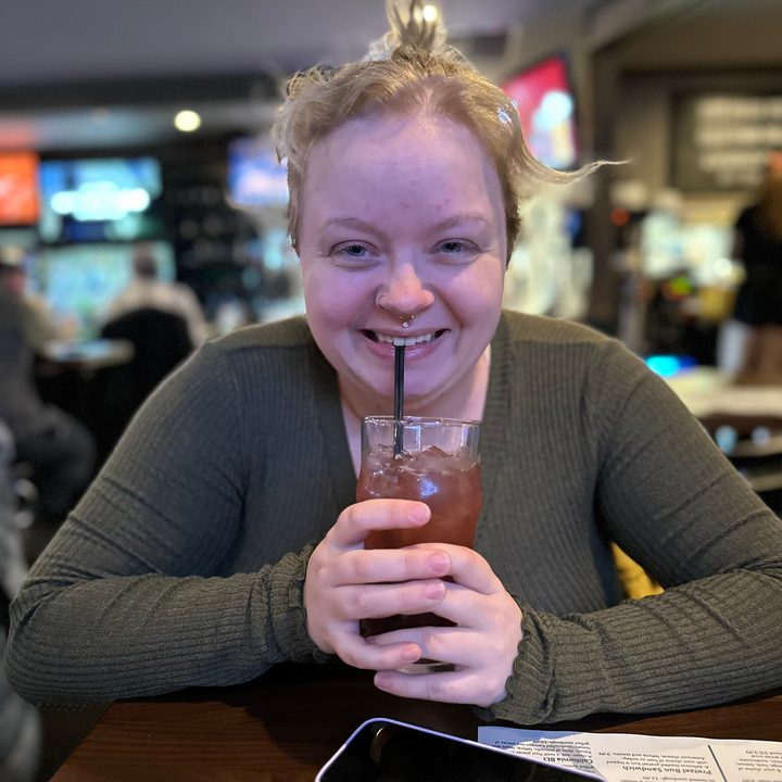 Portrait mode photo of Kenn Maring at a bar.