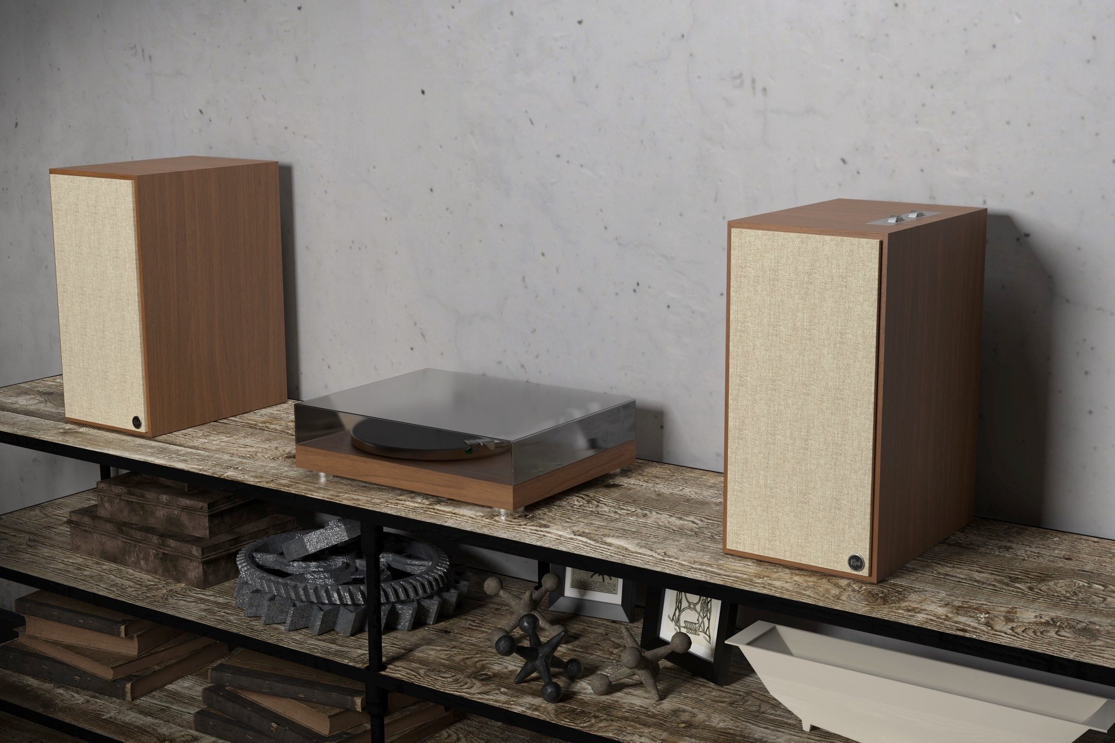 Klipsch The Nines in walnut finish next to a turntable.