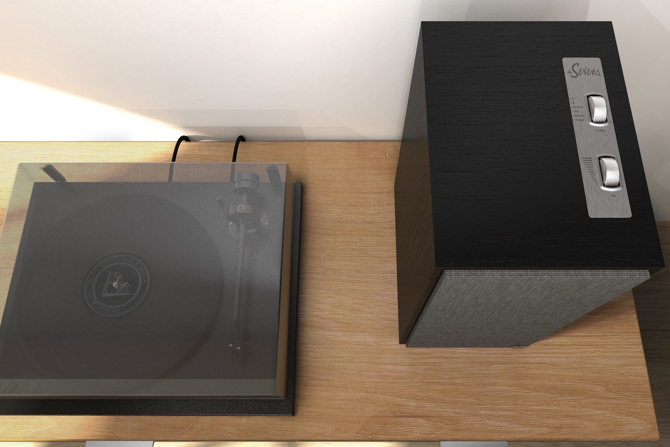 Klipsch The Sevens in ebony finish next to a turntable.