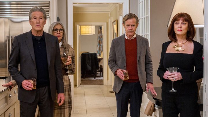 Four adults stand in a kitchen in Maybe I Do.