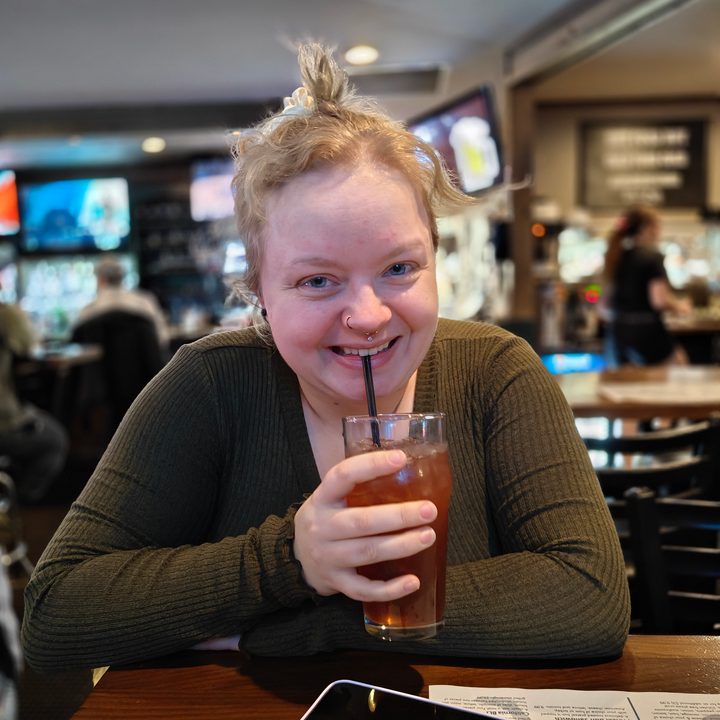 Portrait mode photo of Kenn Maring at a bar.