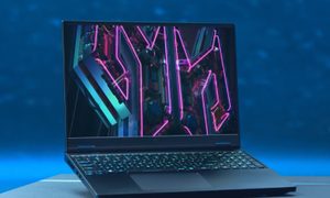 The Predator Helios 16 open on a table.