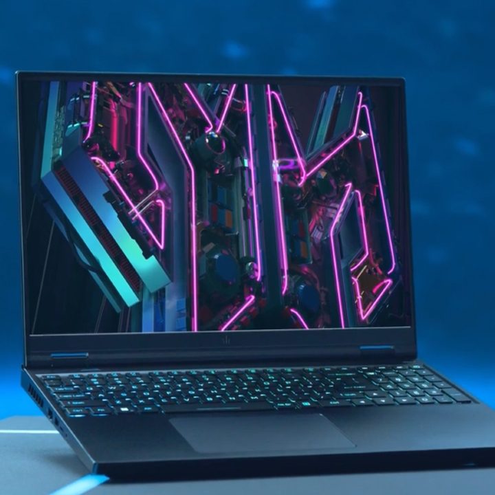 The Predator Helios 16 open on a table.