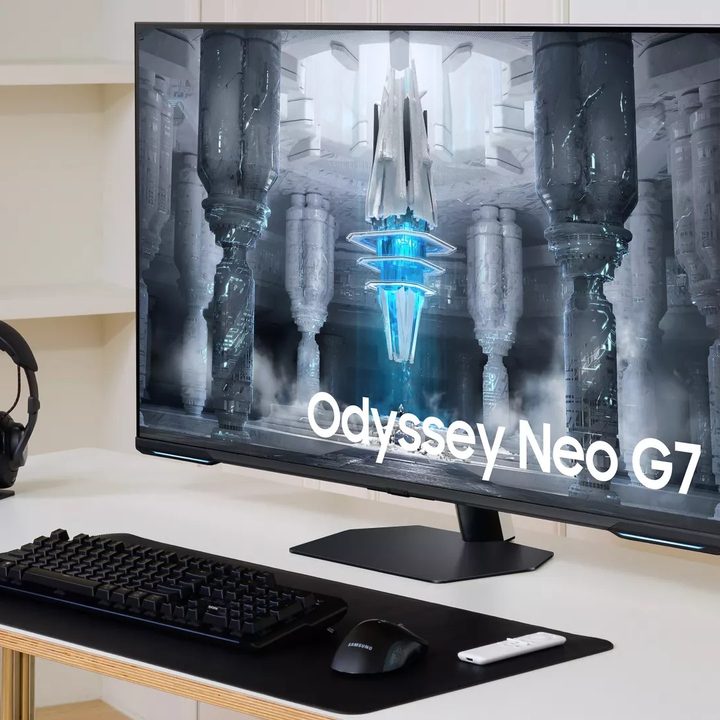 Samsung's Odyssey Neo G7 on a desk.