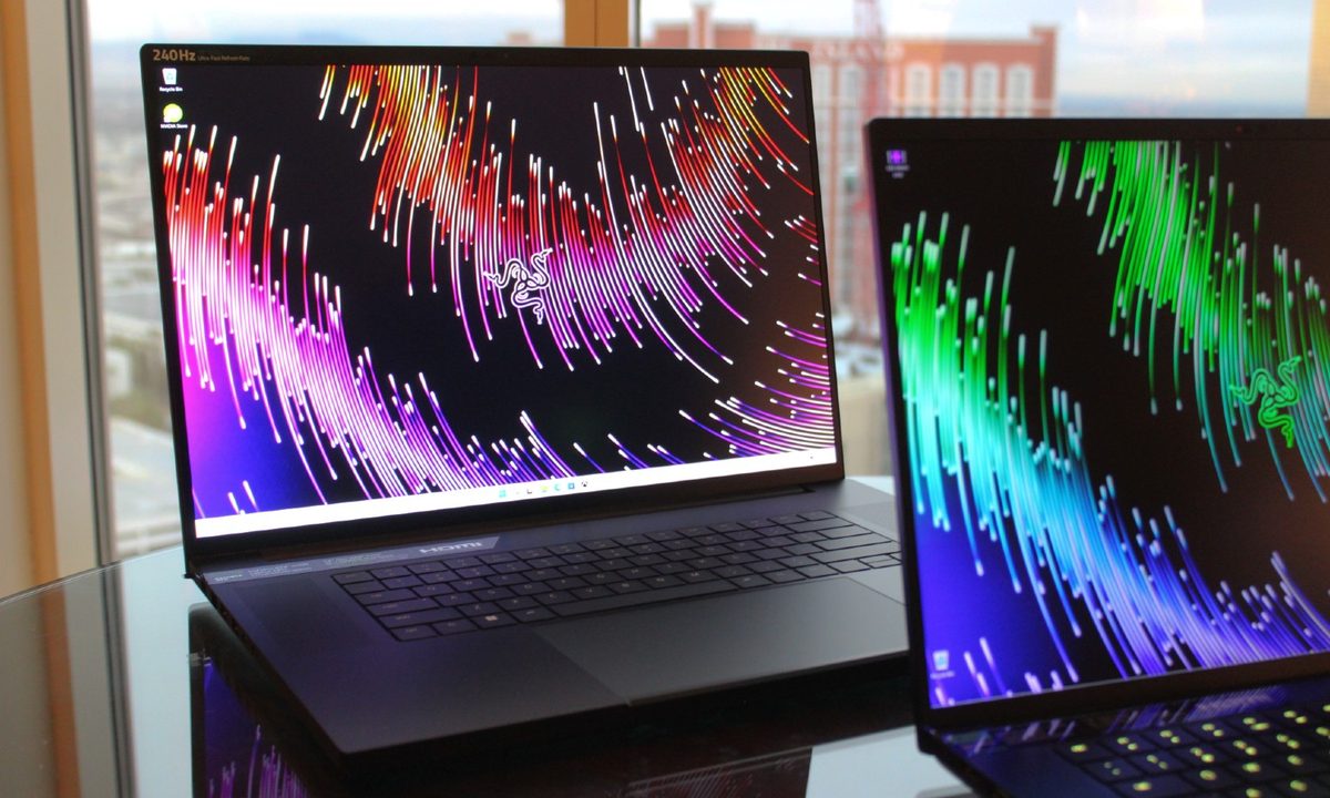 The Razer Blade 16 and 18 in front of a window.