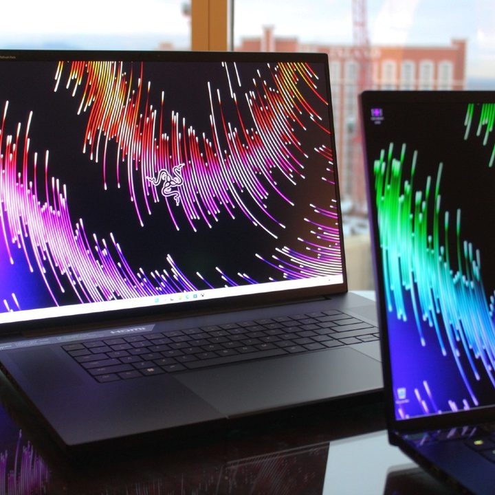 The Razer Blade 16 and 18 in front of a window.