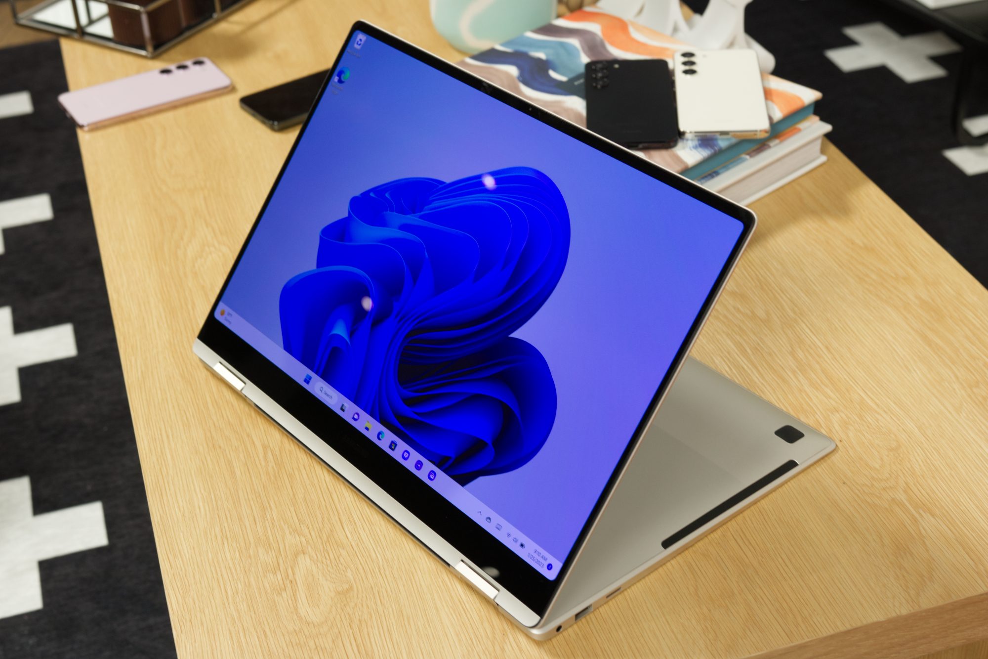 The Samsung Galaxy Book 3 Pro 360 propped up with its 360-degree hinge.