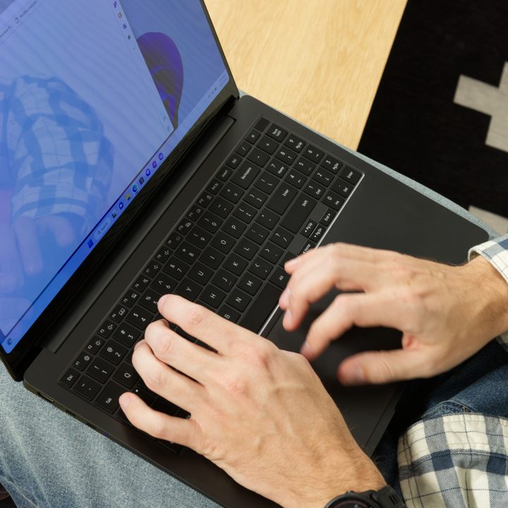 Someone typing on a Samsung Galaxy Book 3 Ultra.