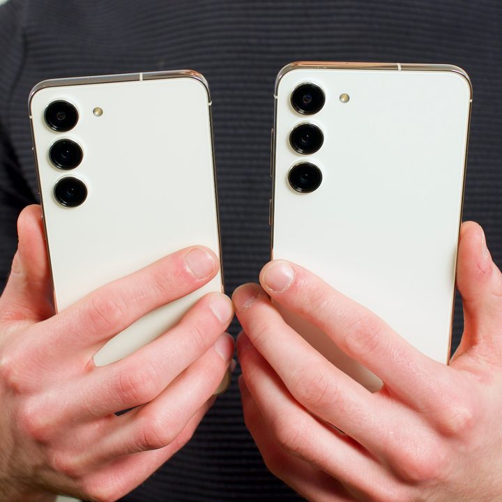 Joe Maring holding a Samsung Galaxy S23 and a Samsung Galaxy S23 Plus.