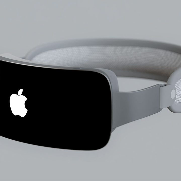 A rendering of an Apple mixed-reality headset (Reality Pro) in a gray color seen from the front.