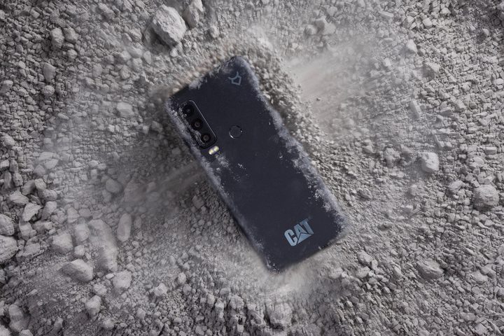 The back of the Cat S75 phone, covered in dust.