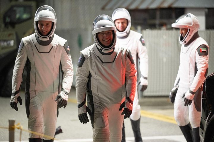 From left, NASA astronauts Warren “Woody” Hoburg and Stephen Bowen, along with Roscosmos cosmonaut Andrey Fedyaev and UAE (United Arab Emirates) astronaut Sultan Alneyadi, prepare to depart the Neil A. Armstrong Operations and Checkout Building at Kennedy Space Center in Florida during a dress rehearsal for NASA’s SpaceX Crew-6 mission launch on Thursday, Feb. 23, 2023.