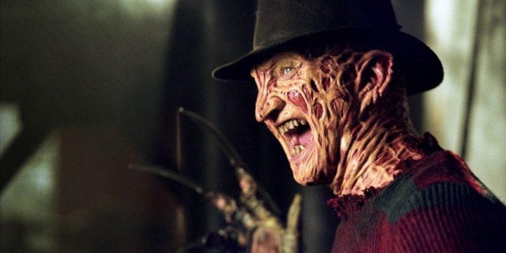 Freddy Krueger shows off his bladed fingers to a victim.
