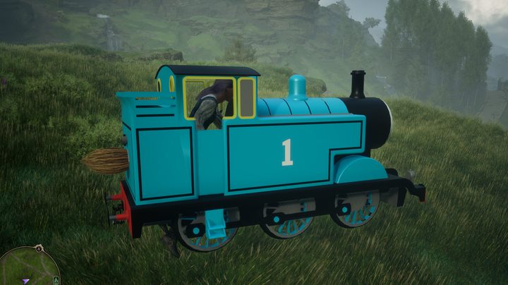 A wizard riding Thomas the train engine.