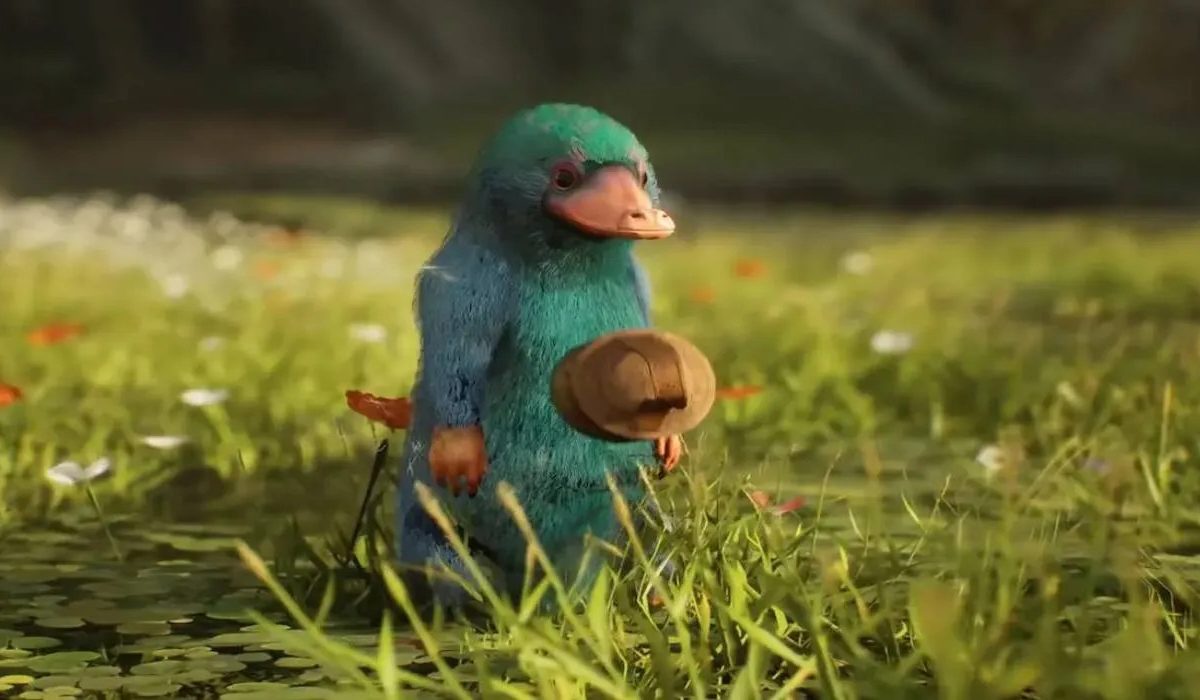 A Niffler standing in some grass.