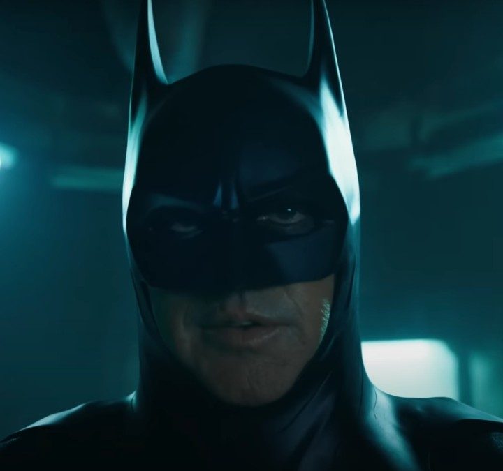 A man as Batman stands and stares in The Flash.