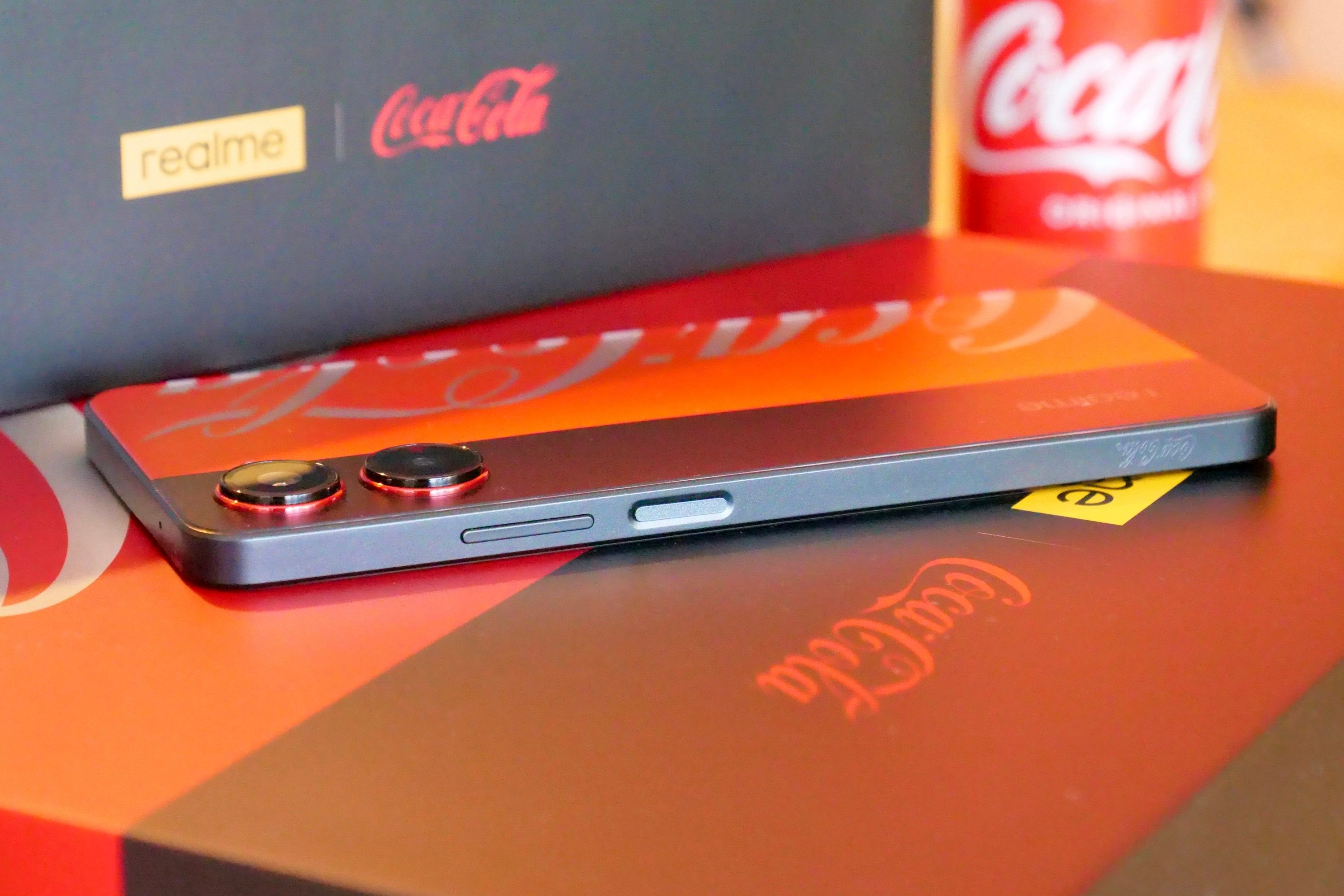 The side of the Realme X Coca-Cola phone.