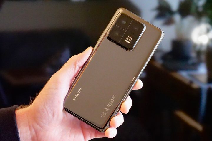 The Xiaomi 13 Pro held in a person's hand.