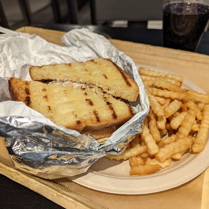 Pixel 7 Pro photo of a chicken sandwich and fries.