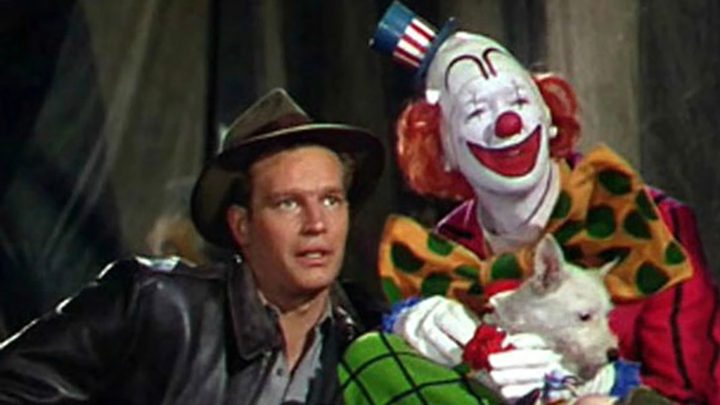 A man with a clown in a scene from The Greatest Show on Earth.