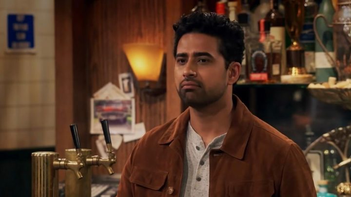 Sid from How I Met Your Father pursing his lip together, looking dejected.