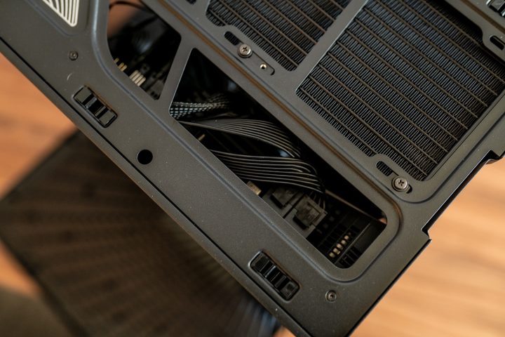 Connectors on top of the motherboard inside a Hyte Y40.