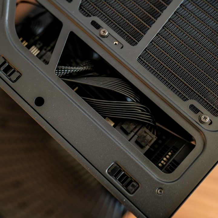 Connectors on top of the motherboard inside a Hyte Y40.