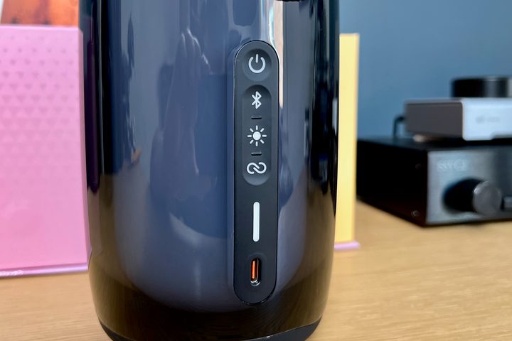 The JBL Pulse 5 Bluetooth speaker, lights off, showing the control buttons.