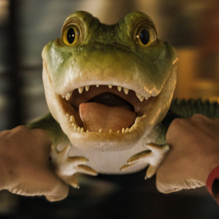 Lyle Crocodile is spun in circles by Hector P. Valenti.