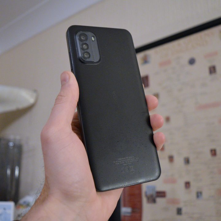 The back of the Nokia G60 5G, held up in a hand.
