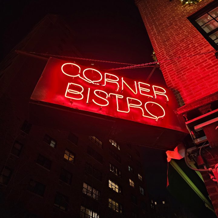 Galaxy S23 Ultra night mode photo of a neon sign that says "Corner Bistro."