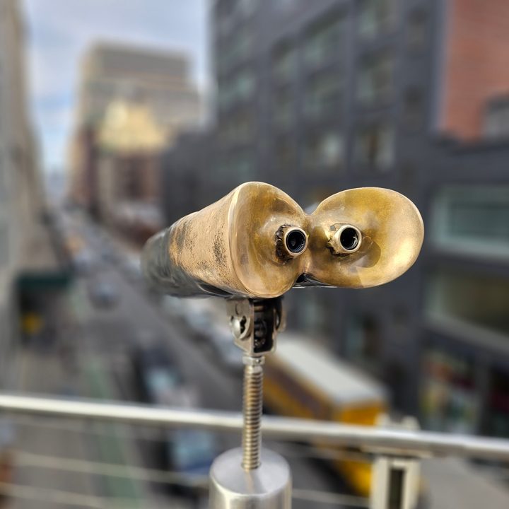Galaxy S23 Ultra portrait mode photo of binoculars looking at downtown Chelsea.